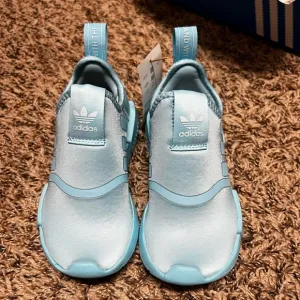 Adidas little girls tennis shoes. Brand new. Never worn. In the box. With tags.