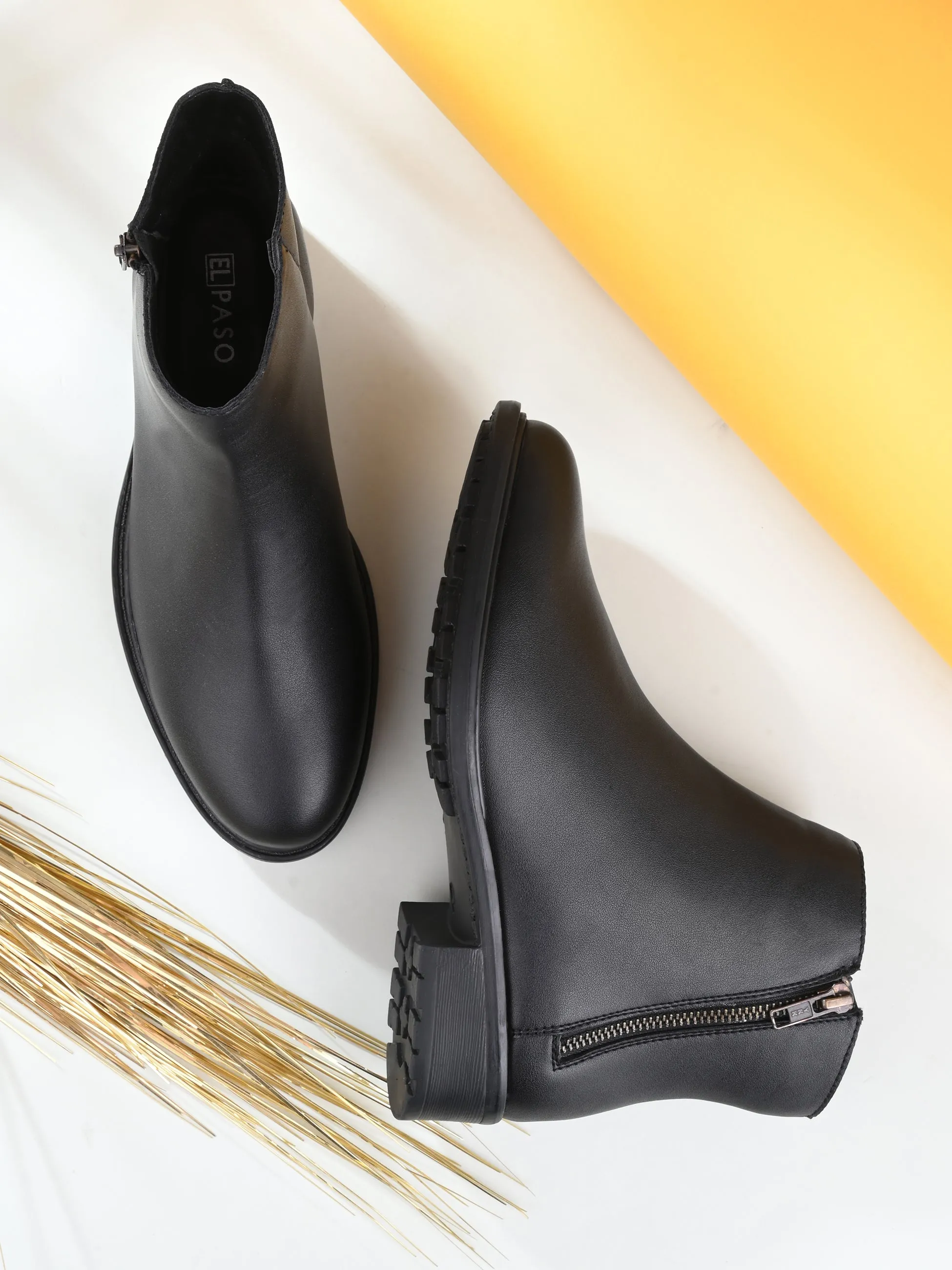 Sophisticated Onyx Leather Zip-Up Boot For Women
